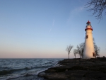 beautiful lighthouse on a rocky shore