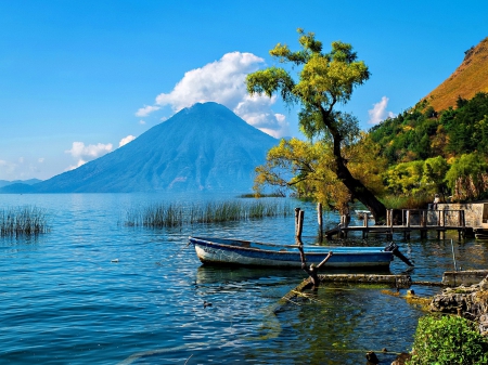 Lake Atitlan, Guatemala - sky, guatemala, trees, dock, water, atitlan, reflection, clouds, boat, lake, mountain, summer, shore, exotic, nature, pier, blue