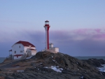 lighthouse on a rocky point