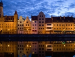 gdansk poland reflected in a river at dusk