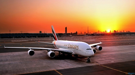 dubai airport at a beautiful sunset - tarmac, airport, city, plane, sunset