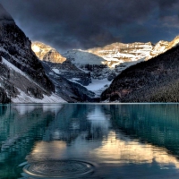 REFLECTIONS IN THE MOUNTAIN LAKE