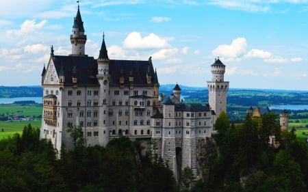 Neuschwanstein Castle - sky, trees, neuschwanstein, colorful, bavaria, clouds, castle, architecture, green, medieval, germany, palace, forests, nature, neuschwanstein castle, blue, beautiful