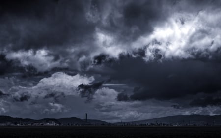 storm clouds forming over a rural village - village, storm, rural, cluds