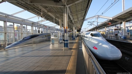 high speed trains in a station in japan - station, trains, electric, tracks