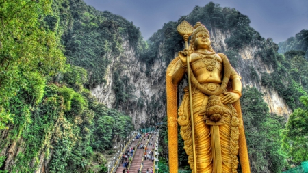 wondrous golden hindu statue in gombak malaysia hdr - caves, hdr, golden, mountains, steps, statue