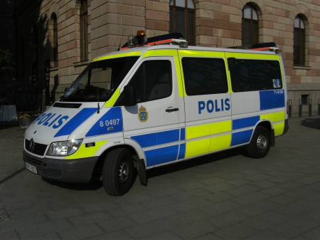 Swedish police bus - white, yellow, blue, stockholm