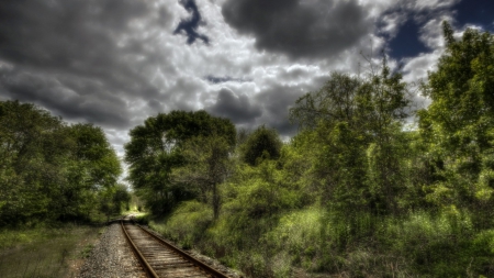 railroad tracks into the forest hdr - clouds, tracks, hdr, gravel, forest