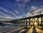 sunrise behind a beautiful pier