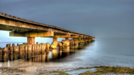 pier into a misty sea - rocks, pylons, beach, pier, sea, mist