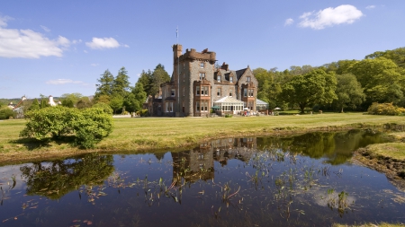 wonderful quaint castle in scotland - lake, lawn, forest, castle