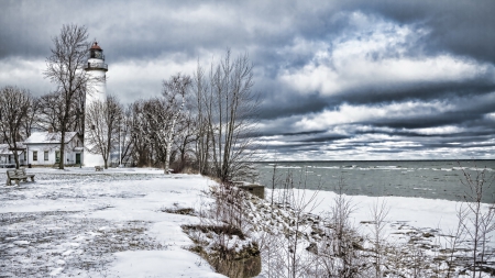 wonderful lighthouse on a seashore in winter - lighthouse, wnter, clouds, shore, sea