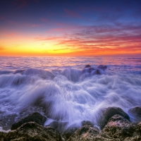 beautiful sea waves at sunset