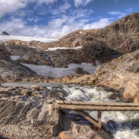 wooden bridge over glacier run off hdr