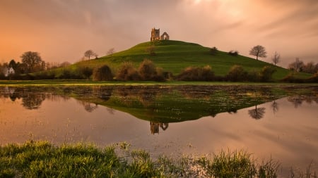 church ruins on a hill above a lake - hill, village, lake, church, ruins, grass