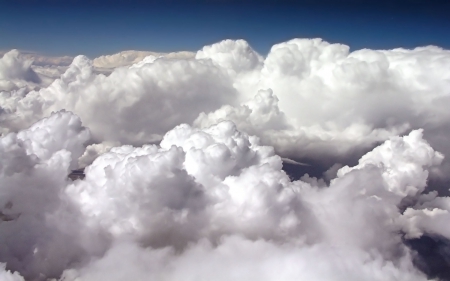 white puffy clouds