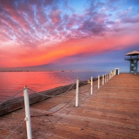 pier on the bay under beautiful sunset