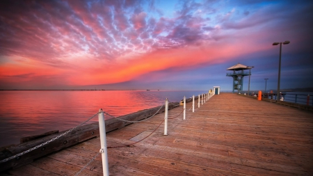 pier on the bay under beautiful sunset - tower, clouds, chain, bay, pier, sunset