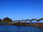 amazing arched bridge at the seashore