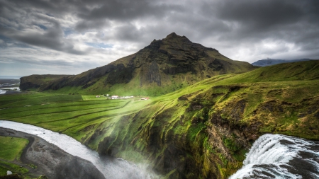 fabulous mountain waterfall in iceland - village, mountain, clouds, stream, waterfalls, grass