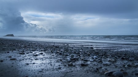 closeup of pebbles on a beach - pebbles, clouds, beach, closeup, sea