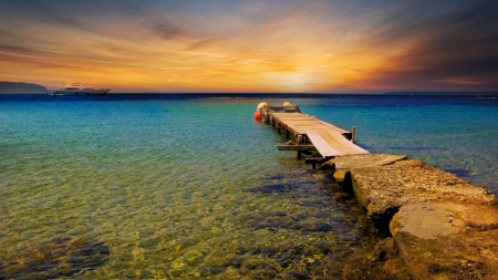 boat dock on a beautiful clear bay - yacht, dock, clear, sunset, bay