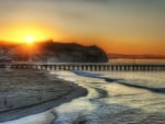 superb sunset over a seaside pier