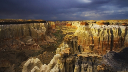 Canyon of Color - clouds, beige, dark, black, canyons, red, green, cliffs, ravine, rocks