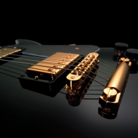 CLOSE UP OF A GUITAR