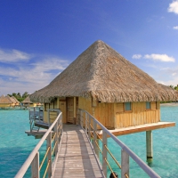 Perfect Water Villa Bungalow over clear blue lagoon ocean Bora Bora Paradise Island Tahiti Polynesia