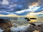 wonderful sunrise over rocky beach