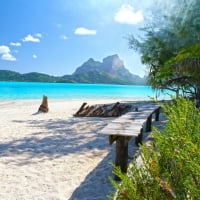 Beautiful white sand beach on Bora Bora near Tahiti Polynesia