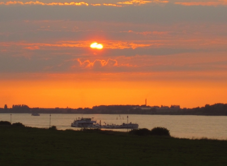 Sunset at the river - photography, sun, water, sunset, nature, cloud, river, beautiful, clouds, red, sunsets, boat