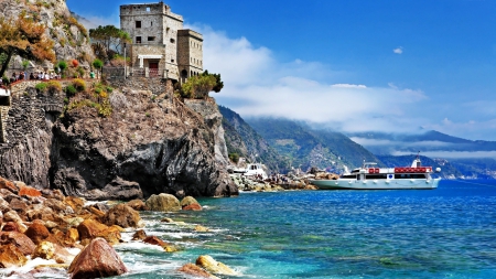 tourists sightseeing a castle on a rocky seacoast - boats, tourists, castle, sea, coast, cliffs