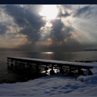 	empty pier in the snow