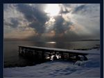 	empty pier in the snow