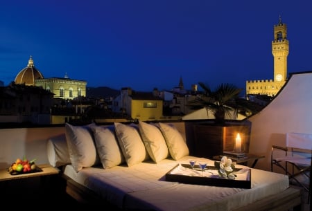 Quiet evening - glasses, sofa, wine, fire, tray, white, flame, home, evening, patio, magnolia, candle, fruits, light, pillows, balcony, chair, rooftop, wineglasses, beautiful, books, solitude, retreat, flower