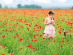 *** Girl on the field of poppies ***