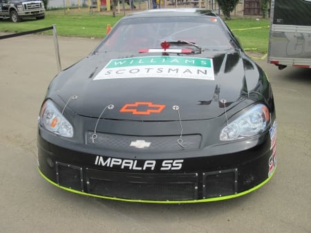 Impala on the raceway - headlights, chevrolet, black, photography