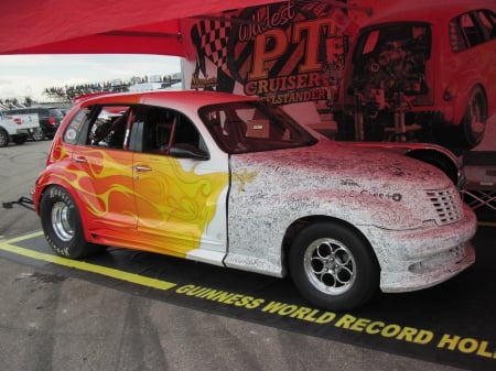 A car with signature on - Car, black, white, tires, yellow, photography, orange