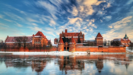 castle in poland by an icy lake in winter - clouds, ice, winter, lake, reflection, castle, wall