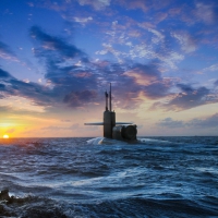 navy seals heading to a submarine