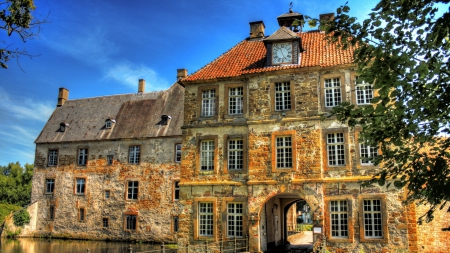 lovely tatenhausen castle in germany - lake, castle, clock, tree, pond, bridge, archway