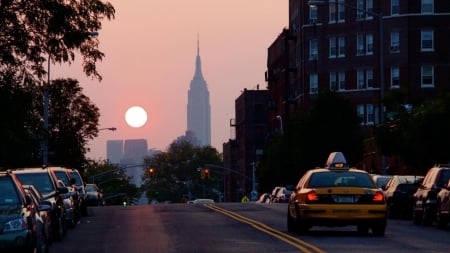 empire state building in the distance at sunset - street, taxi, city, sunset, skyscraper