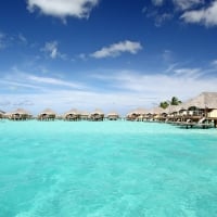 Bora Bora Pearl Beach Resort - tranquil blue lagoon and water villas