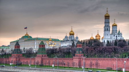 the kremiln compound in moscow - clouds, trees, churches, embankment, buildings, wall