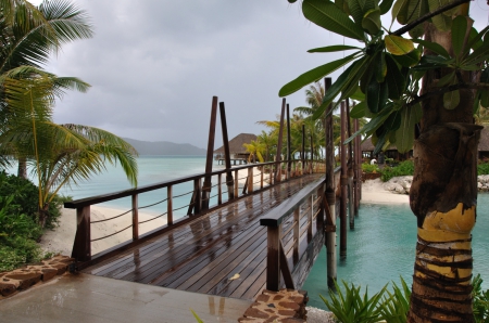 Misty Day at Four Seasons Resort Bora Bora island Polynesia - lagoon, blue, society, beach, island, french, polynesia, sand, tahiti, misty, rain, atoll, exotic, paradise, cloudy, south, sea, ocean, islands, rainy, tropical, bora bora, day