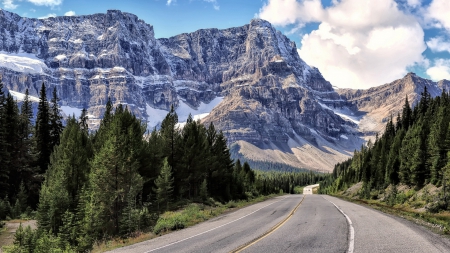 highway along a beautiful mountain range - highway, forest, mountain, clouds