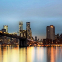 brooklyn bridge on a foggy evening