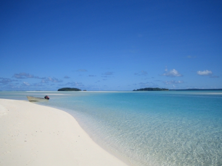 white sand beach and clear blue lagoon - The Cook Islands Polynesia - beach, sky, sun, paradise, clear, escape, white, polynesia, atoll, lagoon, holiday, cook, sand, ocean, islands, tropical, blue, island, sea